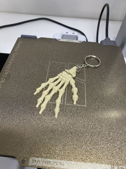 Skelet hand sleutelhanger
